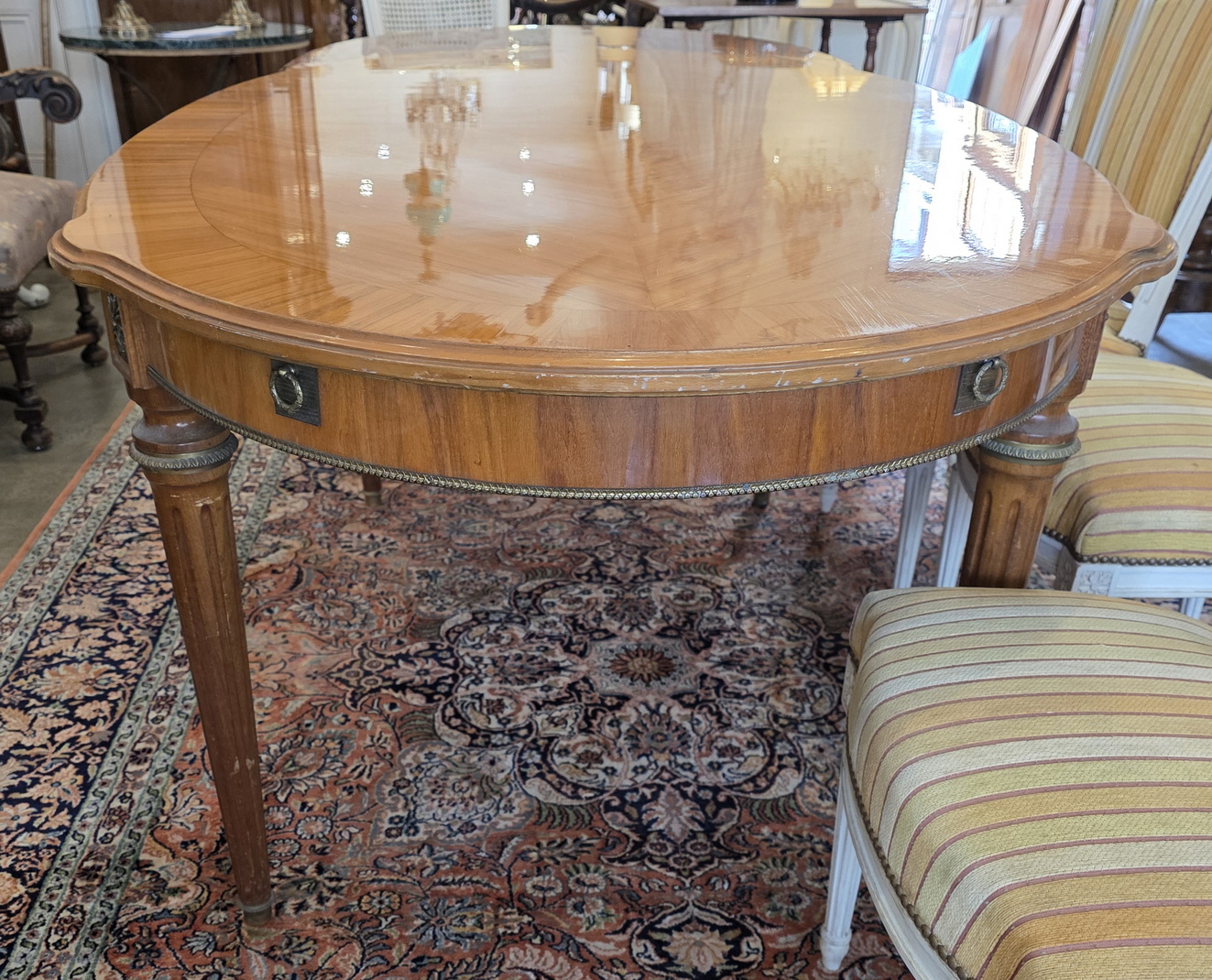 A French Louis XVI Dining Table A French Louis XVI Dining Table